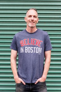 Photo of Chris Wrenn wearing a shirt that says Believe in Boston